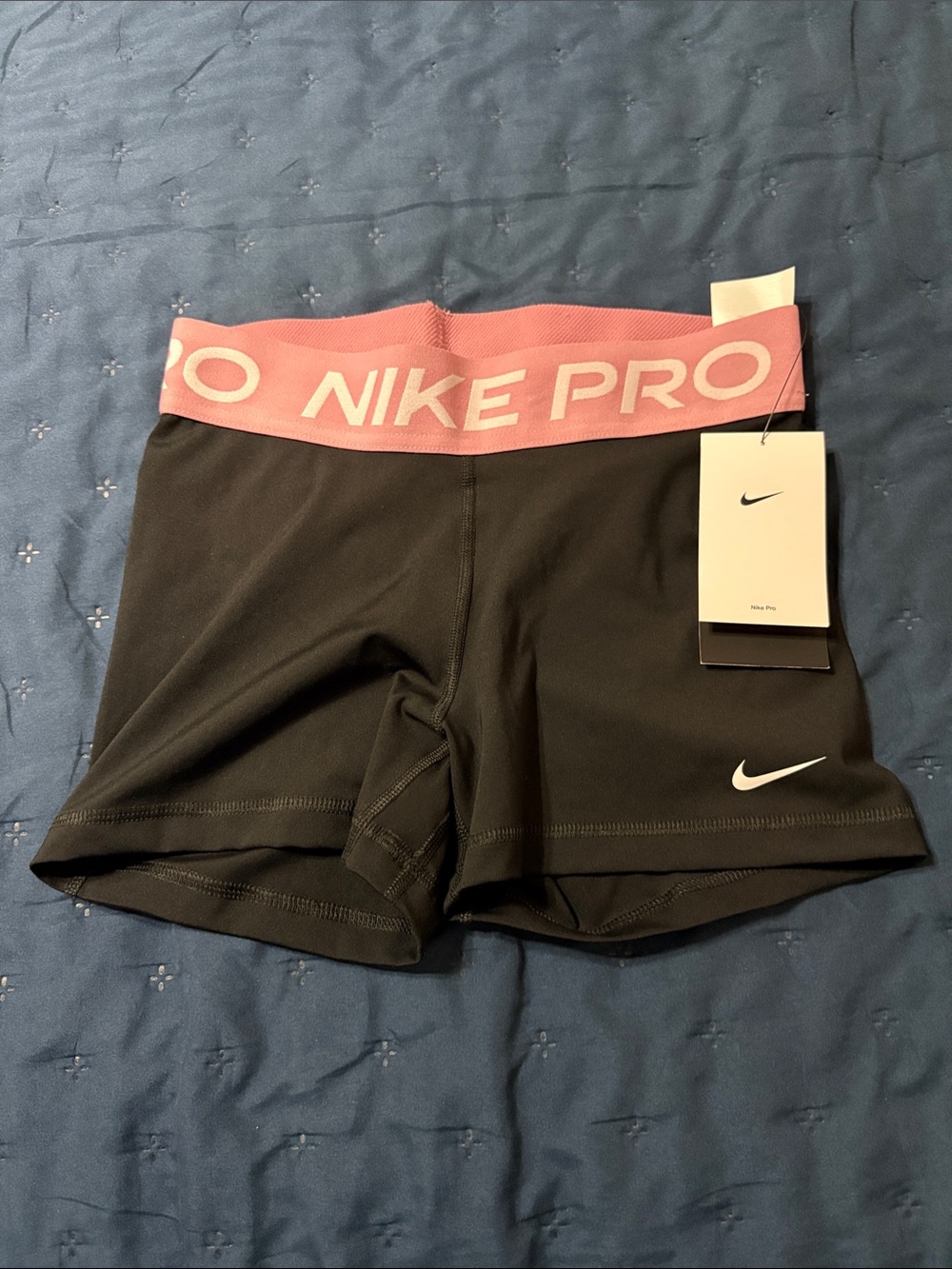 Nike Pro Women's Black Athletic Shorts with Pink Waistband